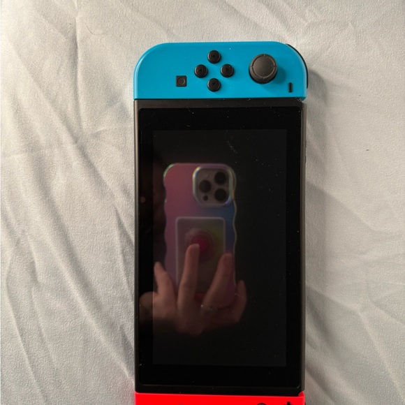 Nintendo Switch with Neon Red and Blue Joy-Cons - Picture 2 of 6